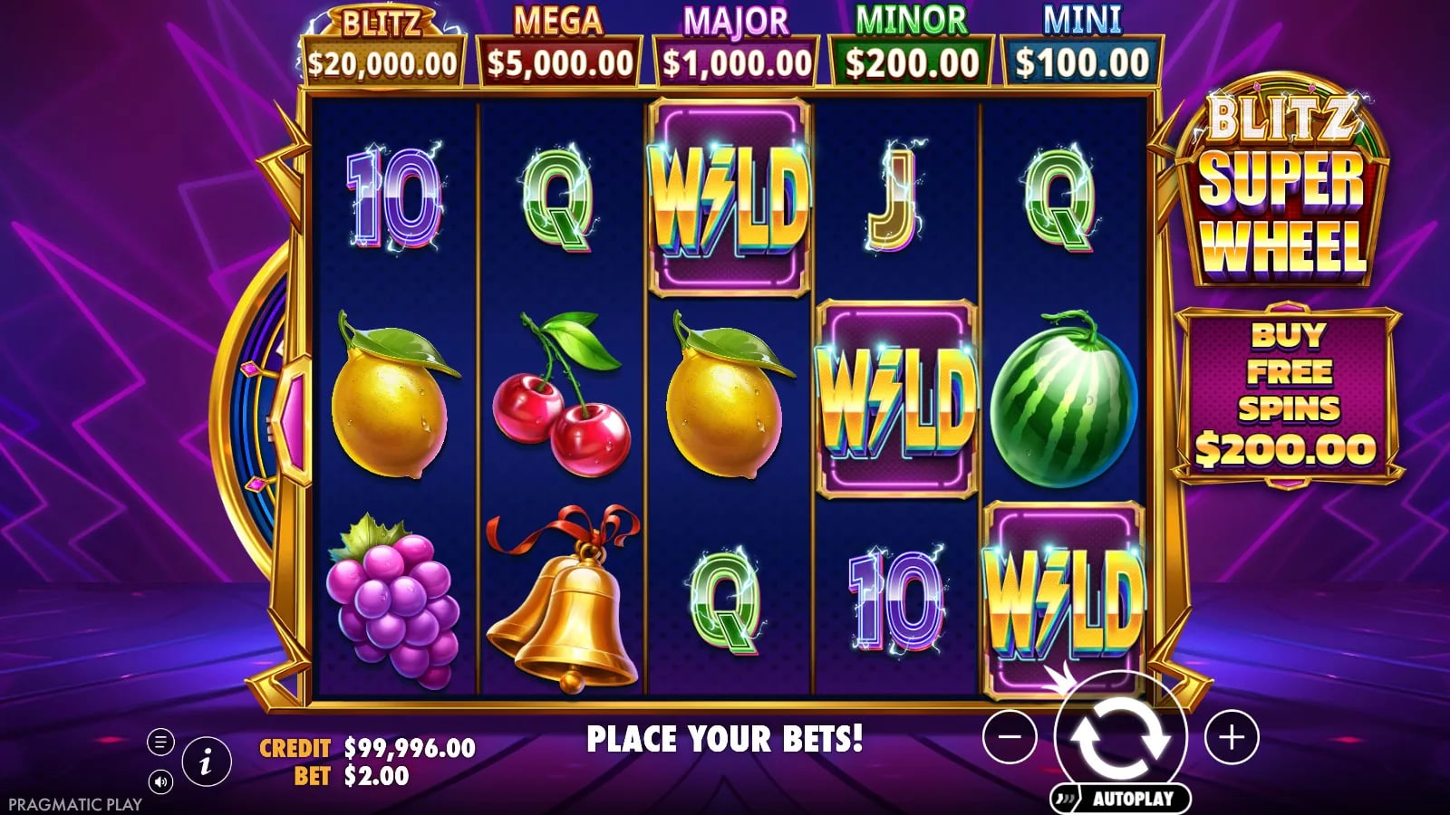 Blitz Super Wheel later base board with three Wild symbols, fruit, letters and jackpot tiers.